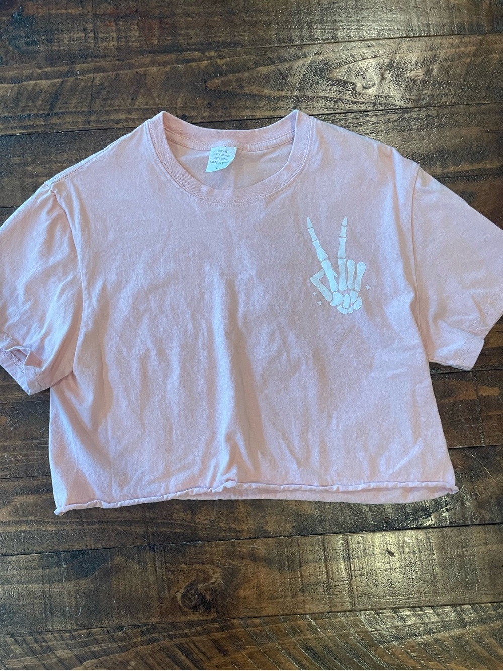 Unk Pink Crop Top with White Skeleton Peace Hand Graphic